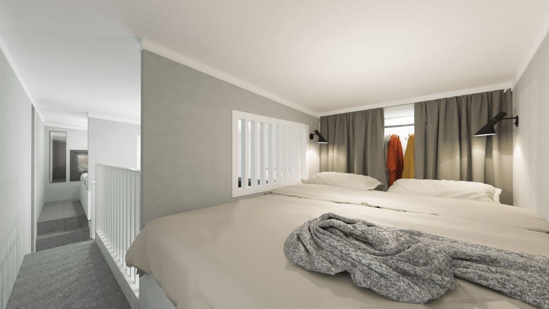 Bild som visar ett av sovrummen på MAX Attefalls ovanvåning. Attefallshus två våningar